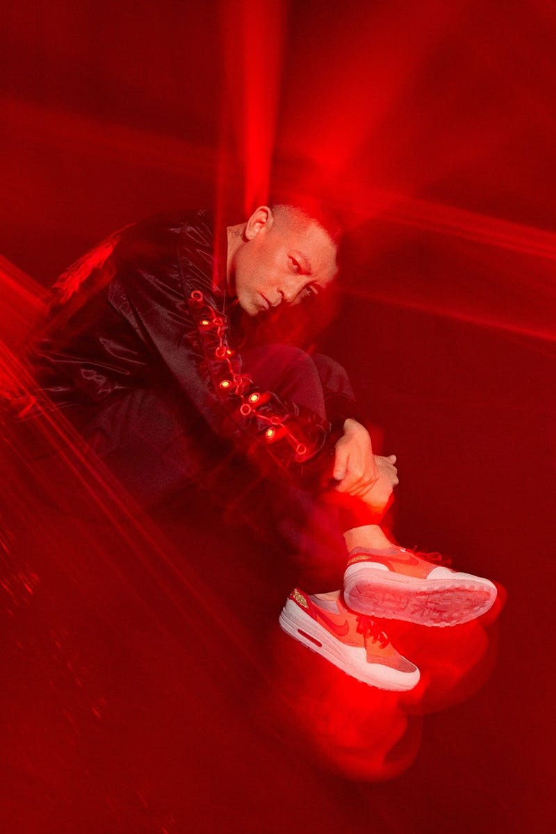 clot air max 1 solar red on feet